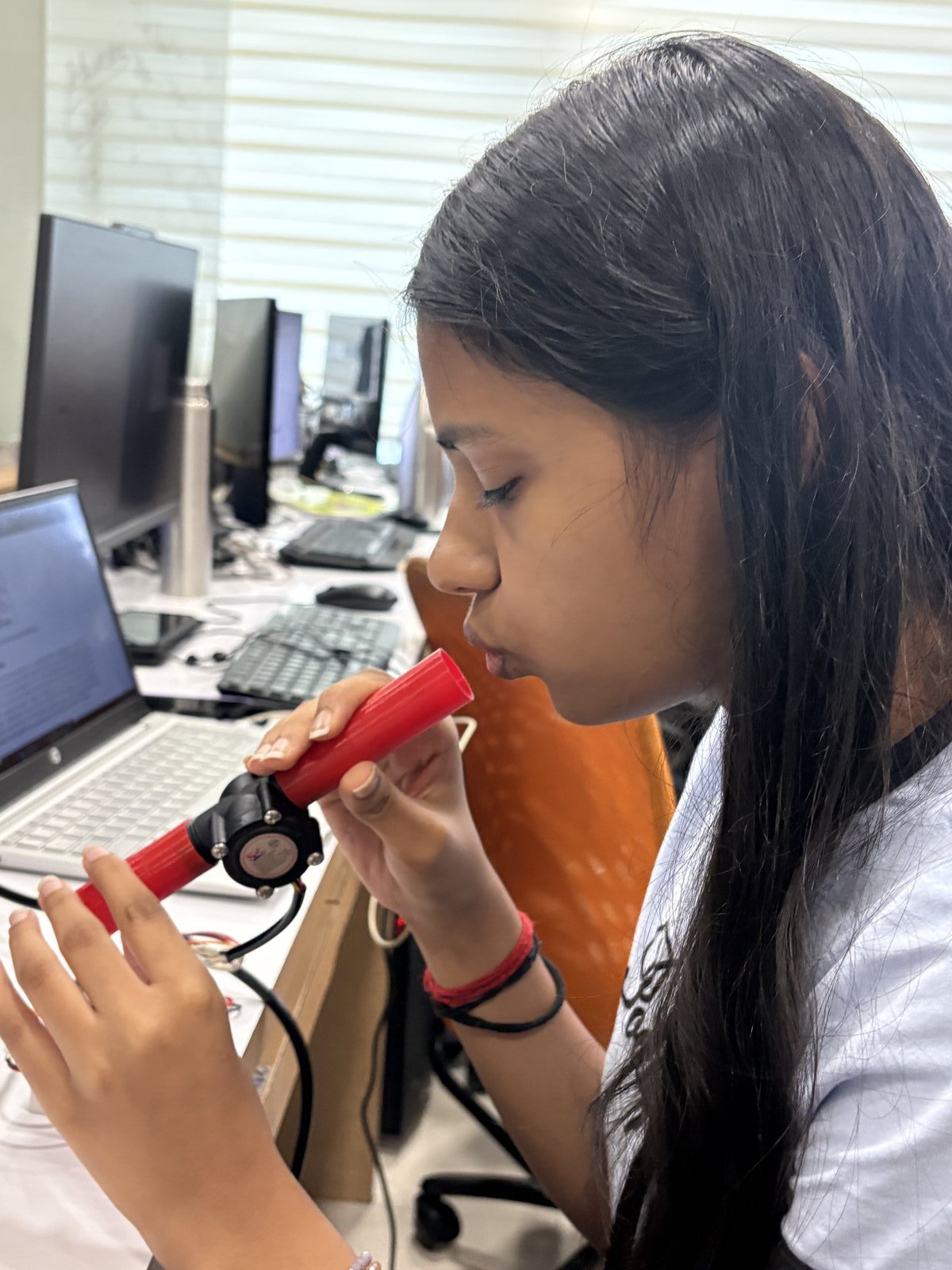 Anagha testing the CoughScope airflow sensor